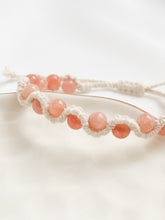 Load image into Gallery viewer, Bracelet with pink beads on a white background