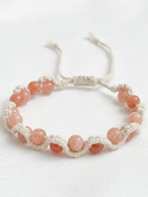 Load image into Gallery viewer, Bracelet with pink beads on a white background
