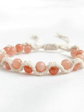 Load image into Gallery viewer, Bracelet with pink beads on a white background