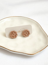 Load image into Gallery viewer, Pair of macrame earrings on a branded card, displayed on a decorative plate.