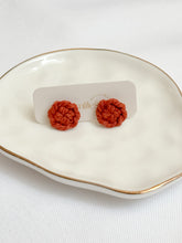 Load image into Gallery viewer, Pair of macrame earrings on a branded card, displayed on a decorative plate.