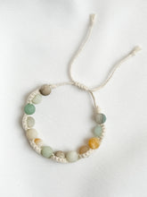 Load image into Gallery viewer, Bracelet with multicolored beads on a white background
