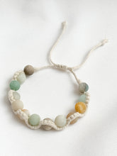 Load image into Gallery viewer, Bracelet with multicolored beads on a white background
