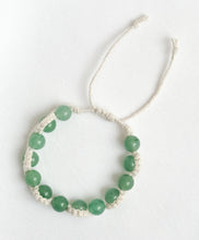 Load image into Gallery viewer, Green beaded bracelet on a white background
