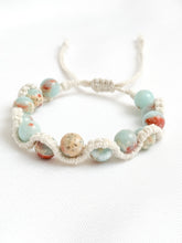 Load image into Gallery viewer, Bracelet with beads on a white background
