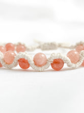 Load image into Gallery viewer, Bracelet with pink beads on a white background
