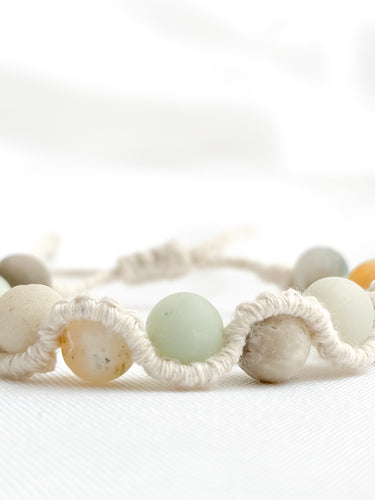 Macrame beaded bracelet in white background