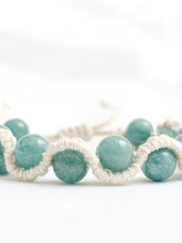 Load image into Gallery viewer, Aquamarine beaded bracelets with white macrame cord on a white background
