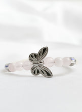 Load image into Gallery viewer, Butterfly-shaped bracelet with beads on a white background
