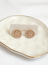 Load image into Gallery viewer, Pair of macrame earrings on a branded card, displayed on a decorative plate.
