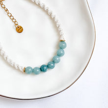 Load image into Gallery viewer, beaed bracelet on a white plate
